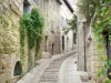 Uzès - Old town: stairway lined with stone houses