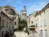 Uzès - Saint-Étienne church and its bell tower, facades of houses in the old town