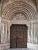 Vallouise - Portal of the Saint-Etienne church and its carved wooden door