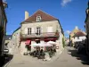 Vézelay - Café terrace and facades of houses in the village