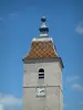 Villages of the Haute-Saône - Bell tower of a church with a glazed tiles roof