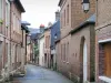 Villequier - Narrow street of the village lined with brick-built houses, in the Norman Seine River Meanders Regional Nature Park