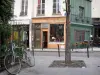 Wijk Quartier latin - Etalages kleurrijke Galande de straat met fiets in de voorgrond