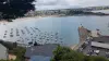 Les stations balnéaires des Côtes-d'Armor - Du lac bleu, vue sur le port d'Erquy et la plage du Centre 