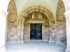 Andlau - Portail de l'église entouré d'une frise sculptée (© J.E)