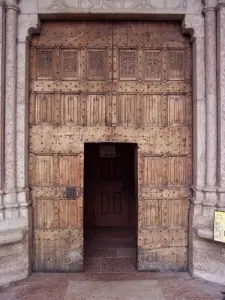 studded door of the church