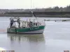 The fishermen return to port