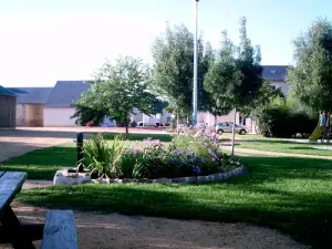 Brissarthe - Behind the town hall in the evening, children's play area