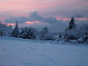 Schnee bei Sonnenuntergang