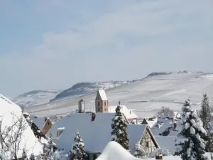 The snow-covered roofs of the village