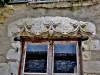 Lintel evoking the siege of Vézelay in 1569 (© J.E)