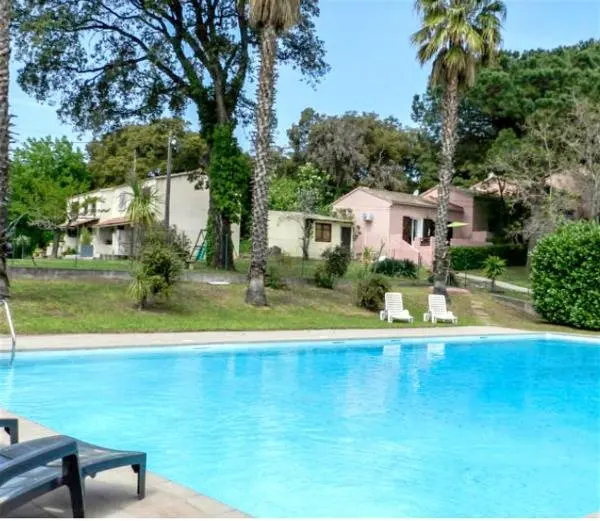 Maison de 2 chambres avec piscine partagee jardin amenage et wifi a San Nicolao a 1 km de la plage - Hotel de férias & final de semana em San-Nicolao