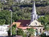 Кейс-Драйвер - Вид на фасад и колокольню церкви Нотр-Дам-де-Л'Ассомпион-и-Сен-Жозеф