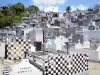 Кладбище Морн-а-Ло - Вид на черно-белую шахматную могилу кладбища; на острове Гранд-Тер