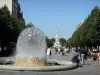 ランス - Place Drouet-d'Erlon：噴水、木々、噴水Subéを背景に