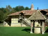 Guide of the Ain - Savoyard Bresse - Grange du Clou, Bressan farmhouse with its Saracen chimney and its well; in Saint-Cyr-sur-Menthon 