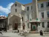 Arles - République square with its fountain and the carved portal of the Saint-Trophime church (Provençal Romanesque art)