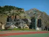 Avoriaz - Tennis court, ski lifts, chalets and ski resort residences, and mountains in Haut-Chablais