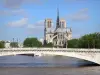 Banks of the Seine river - Tournelle bridge spanning the Seine river and Notre-Dame cathedral on Île de la Cité