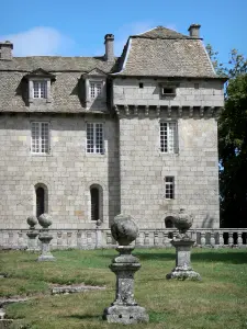 La Baume castle - Park and facade of the castle; in the town of Prinsuéjols