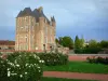 Bellegarde castle - Keep of the château and rosebushes (roses) of the public garden