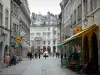 Besançon - Café terrace, shops and facades of the Battant street