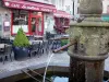 Besse-et-Saint-Anastaise - Medieval and Renaissance town: fountain and café terrace