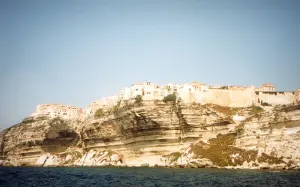 Bonifacio - Old town perched on its calcareous plateau (high white cliffs) and the Mediterranean sea