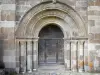 Bredons church - Portal of the priory church Saint-Pierre