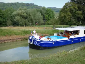 Burgundy Canal - Barge sailing on the canal