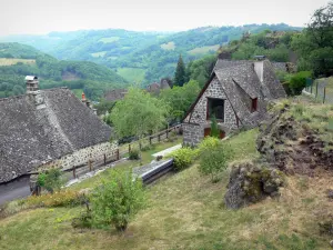 Carlat rock - Stone houses at the foot of the rock of Carlat