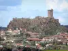 Castelo Polignac - Fortaleza de Polignac empoleirado em seu monte de basalto e dominando as casas da vila medieval
