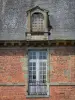 Château de Carrouges - Details of the château: window, skylight, brick and stone facade, slate roof