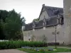 Château de Fougères-sur-Bièvre - Fortified Château, lawn, flowers, shrubs and trees