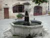 Châteldon - Fountain and old house (old pharmacy) in the medieval village