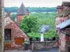 Collonges-ла-Руж - Особняки средневековой деревни в зелени