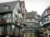 Colmar - Half-timbered houses decorated with geranium flowers