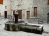 Colmars - Fountain and houses of the medieval town
