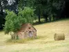 Corrèze landscapes - Stone hut and haystack in a field