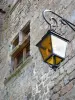 Désaignes - Wall lantern and window of the Désaignes castle