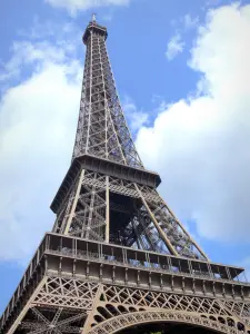 Eiffel tower - Eiffel tower on a cloudy blue sky background