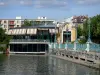 Enghien les Bains - Cidade termal: antigo coreto (rotunda que abriga uma brasserie), gradeamento e postes de iluminação em estilo Art Nouveau no cais do Lago Enghien
