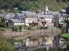 Estacionando - Casas da cidade medieval refletida nas águas do Lot