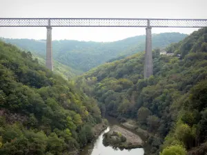 Fades Viaduct - Railway bridge (one of the highest in Europe) overhanging the river Sioule and hills covered with forests; in the town of Sauret-Besserve