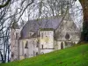 Fontaine-Henry castle - Chapel, lawn and branches of trees