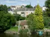 Fresnay-sur-Sarthe - Houses of the medieval town, greenery and River Sarthe