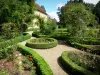 George Sand's house - George Sand's domain (château de Nohant): flowerbeds in the garden; in the town of Nohant-Vic