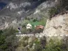 Guil gorges - Gorges road, houses, trees and mountain; in the Queyras Regional Nature Park