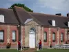 Haras National du Pin - Façade de l'écurie n°1 ; sur la commune de Le Pin-au-Haras