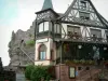Haut-Barr castle - Half-timbered house (restaurant) and big rock in background
